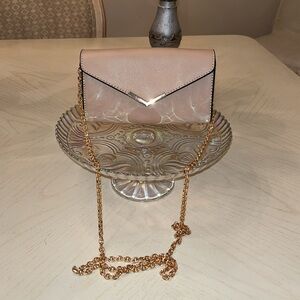 Cross body or shoulder bag . Added a beautiful  a gold chain to use
